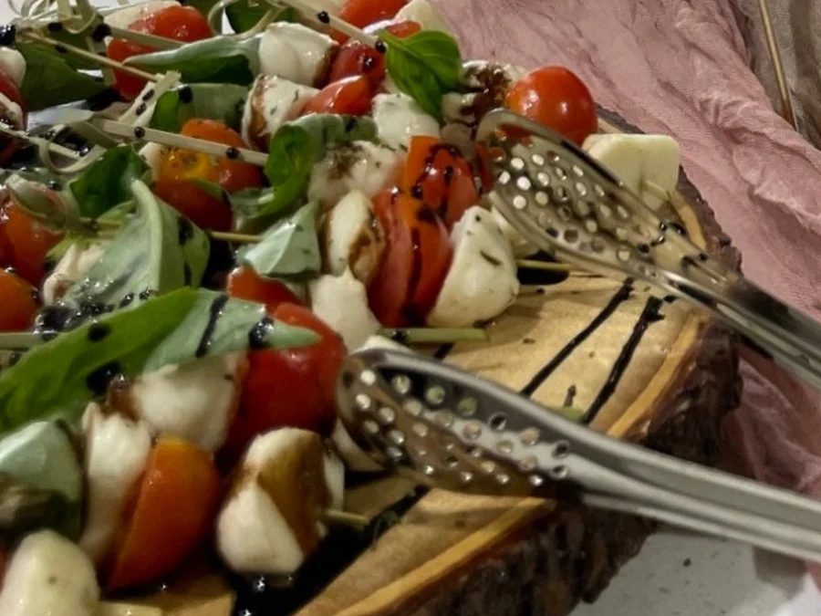 Caprese skewers with tomato, mozzarella, basil and balsamic