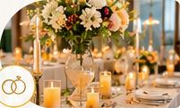 Elegantly set wedding table with candles and florals
